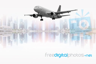 Civil Aircraft And The City Stock Photo