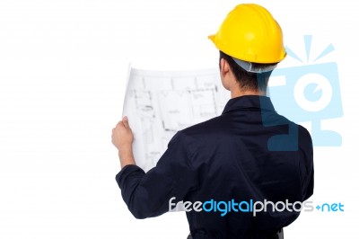 Civil Engineer Reviewing Blueprint Stock Photo