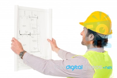 Civil Engineer Reviewing Blueprint Stock Photo