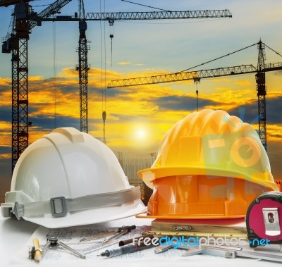 Civil Engineer Working Table With Safety Helmet And Writing Inst… Stock Photo