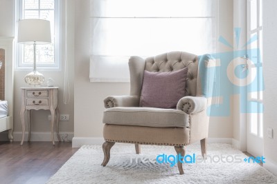 Classic Chair On Carpet With Pillow Stock Photo