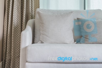 Classic White Sofa With Pillows Stock Photo