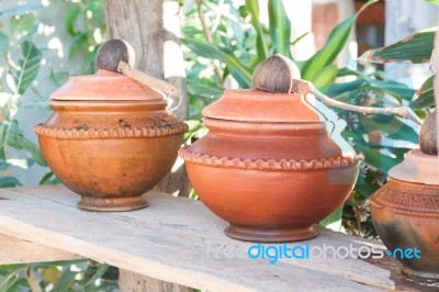 Clay Pot Filled With Water Stock Photo