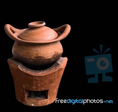 Clay Pot On Black Background Stock Photo