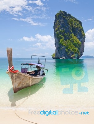 Cliff And Boat Stock Photo