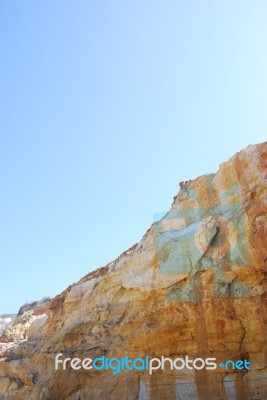 Cliff At Praia Del Rey Stock Photo