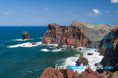 Cliffs At St Lawrence Madeira Showing Unusual Vertical Rock Form… Stock Photo