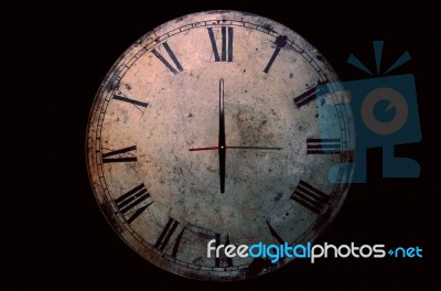 Clock On A Black Background Stock Photo