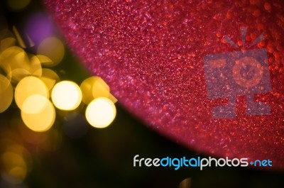 Close Up Big Red Glitter Ball Christmas On Tree With Wire White Light Background Stock Photo