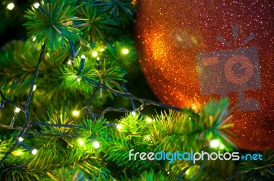 Close Up Big Red Glitter Ball Christmas On Tree With Wire White Light Background Stock Photo