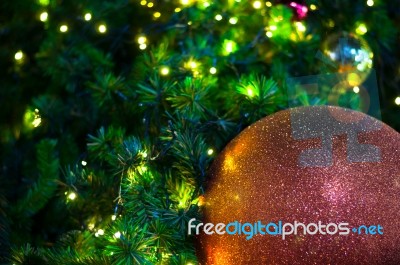 Close Up Big Red Glitter Ball Christmas On Tree With Wire White Light Background Stock Photo