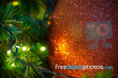 Close Up Big Red Glitter Ball Christmas On Tree With Wire White Light Background Stock Photo