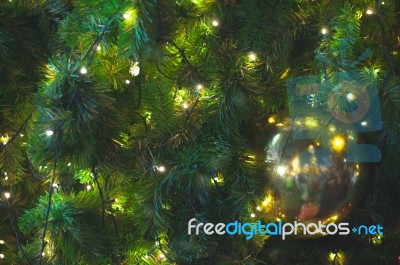 Close Up Big Yellow Glitter Ball Christmas On Tree With Wire White Light Background Stock Photo