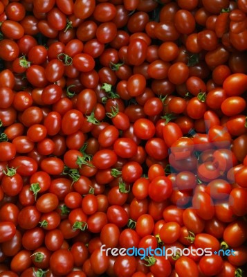 Close Up Group Of Red Tomatoes On Ground Use For Beautiful Backg… Stock Photo