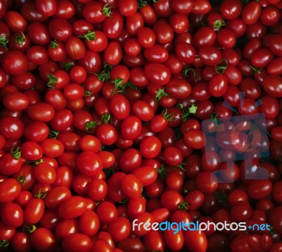 Close Up Group Of Red Tomatoes On Ground Use For Beautiful Backg… Stock Photo