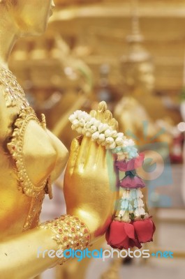 Close-up Hand Of Golden Statue Of Kinara Sawasdee At Wat Phra Kaew In Bangkok, Thailand Stock Photo