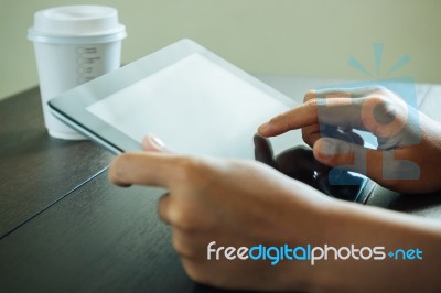 Close Up Hand Use Tablet On Table Stock Photo