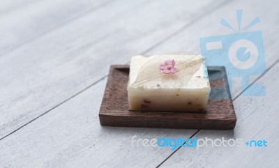 Close Up Natural Soap Bar On Wooden Soap Dish Stock Photo