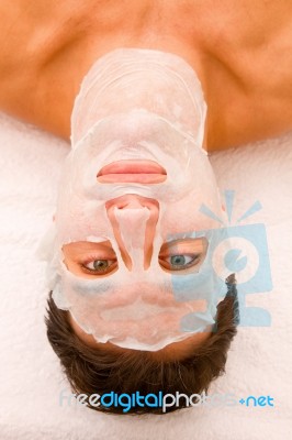 Close-up Of A Young Man With Face Mask Stock Photo