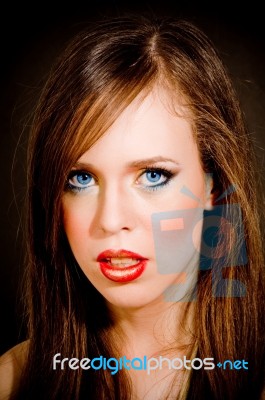 Close Up Of Beautiful Woman Looking At Camera Stock Photo