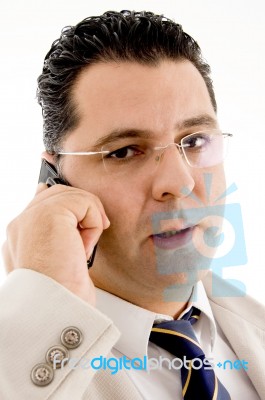 Close Up Of Businessman Busy On Phone Call Stock Photo