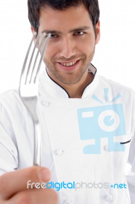 Close Up Of Chef Holding Fork Stock Photo