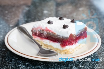 Close-up Of Delicious Raspberry Cake Isolated On White Stock Photo