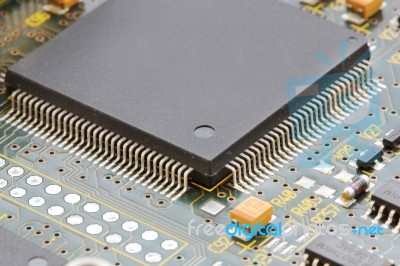 Close Up Of Electronic Circuit Board With Processor Stock Photo