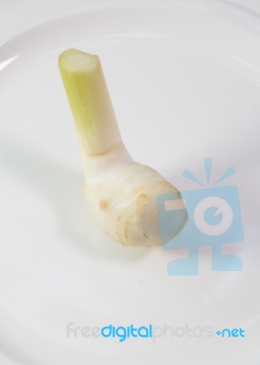 Close Up Of Galangal In Ceramic Dish Stock Photo