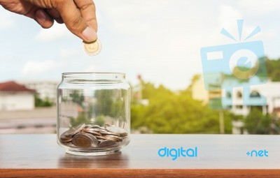 Close Up Of Glass Bottle Stacking Silver Coins Stock Photo