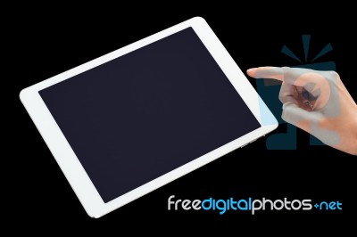 Close Up Of Hand Touching Tablet Pc Stock Photo