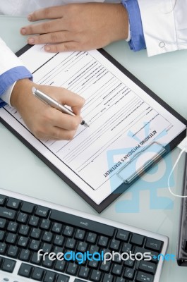 Close Up Of Hands And Writing Board Stock Photo