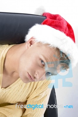 Close Up Of Male In Christmas Hat Stock Photo