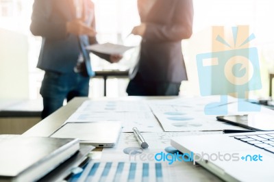 Close-up Of Office Desk With Business Team Discussting Work Proj… Stock Photo