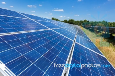 Close Up Of Solar Panels In Straight Line Stock Photo