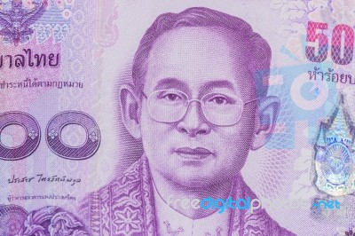 Close Up Of Thailand Currency, Thai Baht With The Images Of Thailand King. Denomination Of 500 Bahts Stock Photo