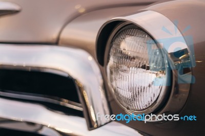 Close-up Of The Front Of The Brown Vintage Car Stock Photo