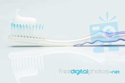 Close Up Of Tooth Paste On Brush Stock Photo