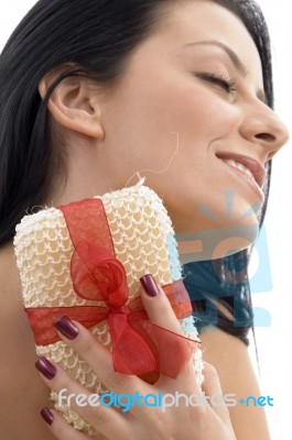 Close Up Of Woman Scrubbing Her Neck Stock Photo