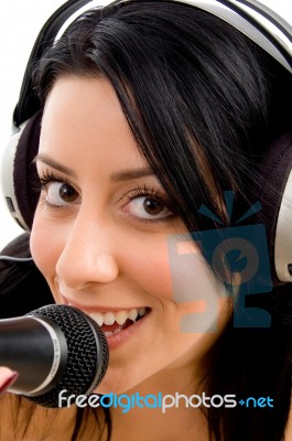 Close Up Of Woman With Headphone And Microphone Stock Photo