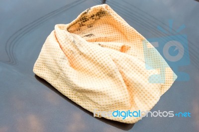 Close Up Of Yellow Chamois (microfiber Towel) On Car Stock Photo