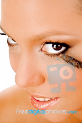 Close Up Of Young Woman Getting Makeup Stock Photo