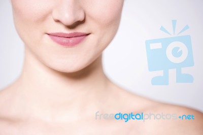 Close Up  Shot Of Woman Face And Bare Shoulders Stock Photo