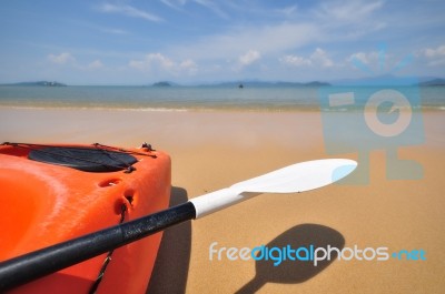 Close-up Side Of Kayak Boat With Paddle Stock Photo