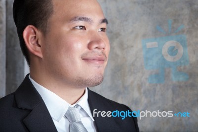 Close Up Skin On Face Of Young Asian Business Man Looking To For… Stock Photo