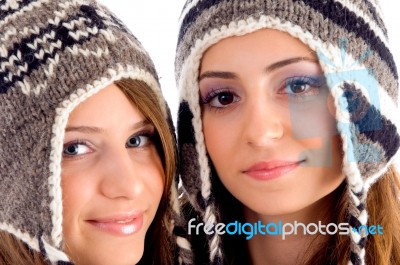 Close Up View Of Cute Teens Wearing Woolen Cap Stock Photo