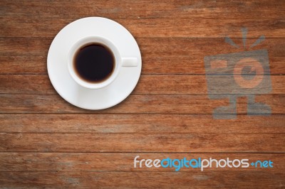 Close Up White Coffee Cup On Wooden Table Stock Photo