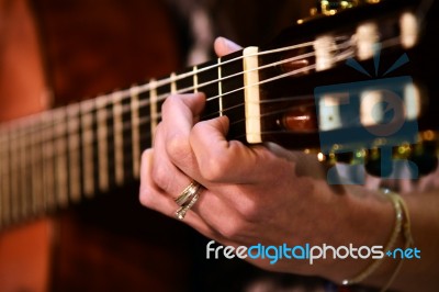 Close Up Woman Guitar Player Stock Photo