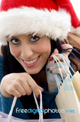 Close View Of Happy Christmas Woman Carrying Shopping Bags Stock Photo