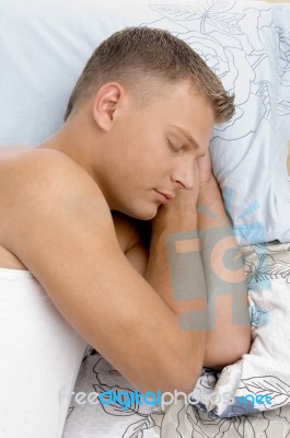 Close View Of Sleeping Young Guy Stock Photo